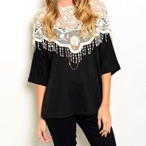 Auditions top in black with white crochet detail